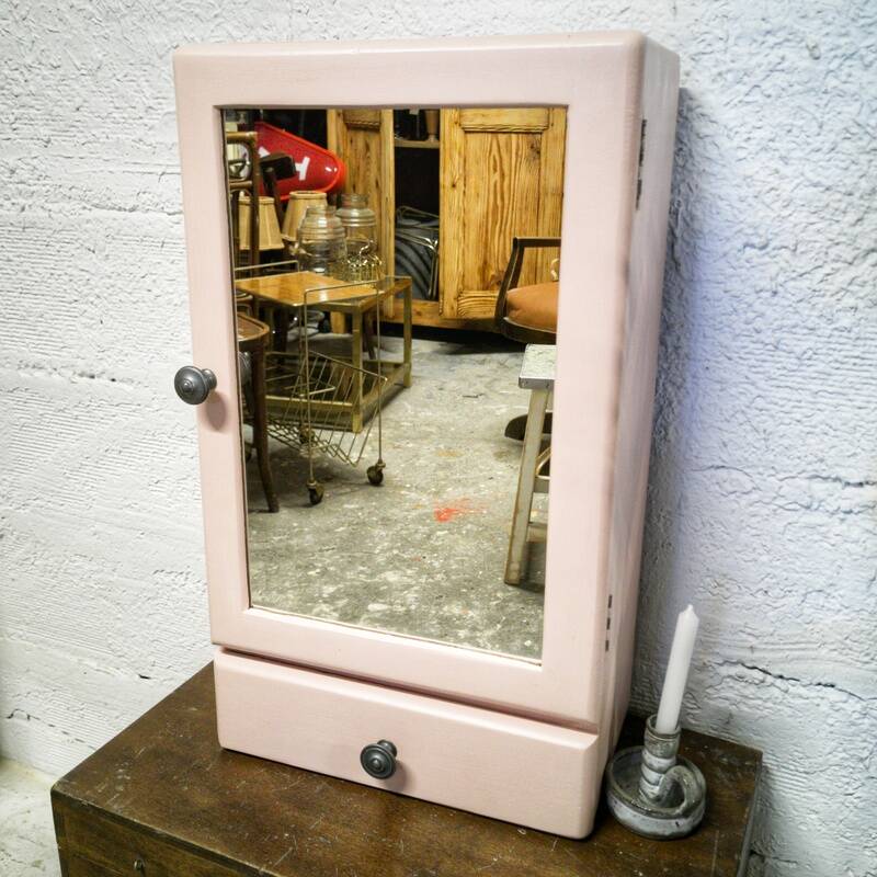 Pink bathroom cabinet