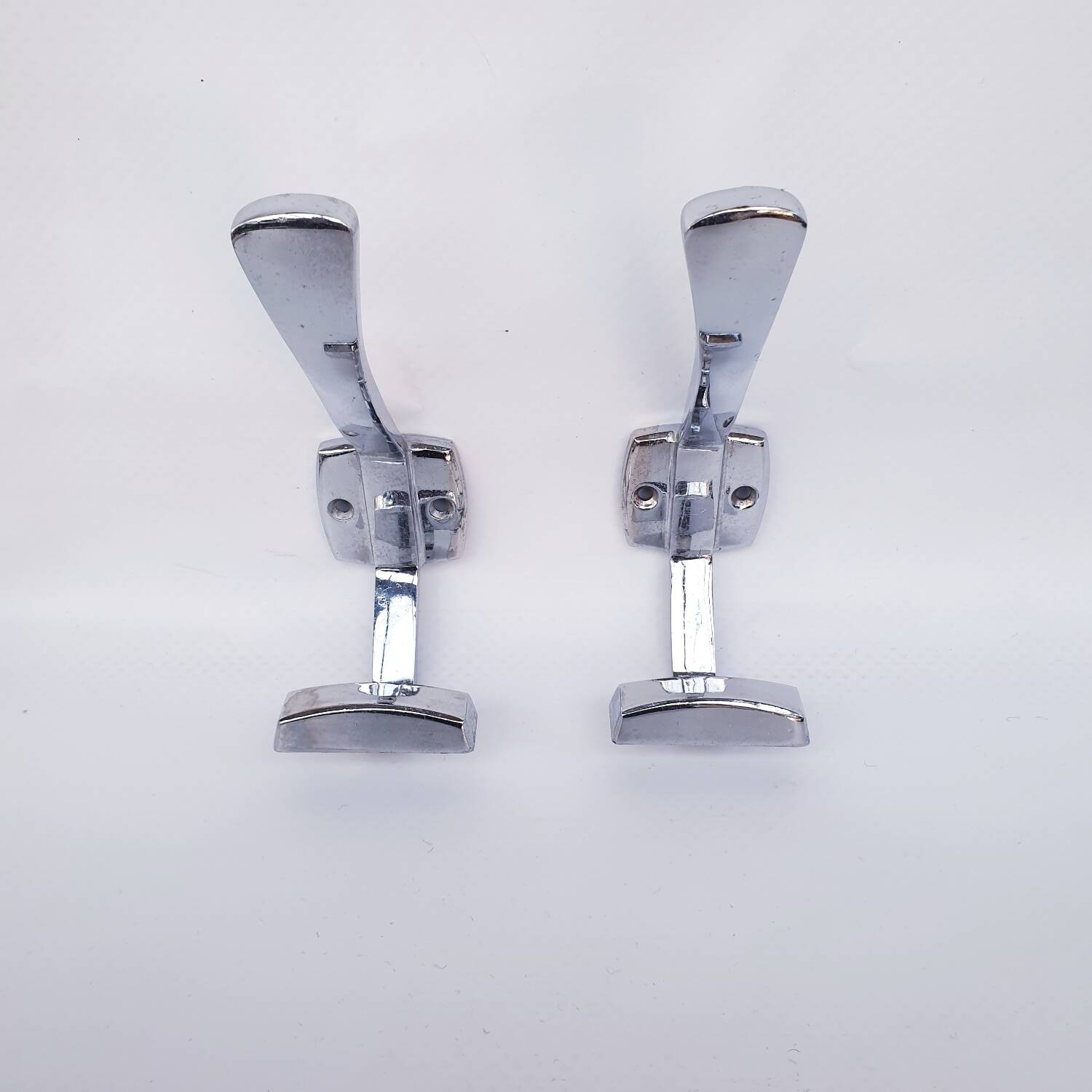 Pair of vintage chrome metal wall hooks