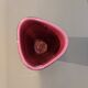 Ceramic vase with granite effect and pink background