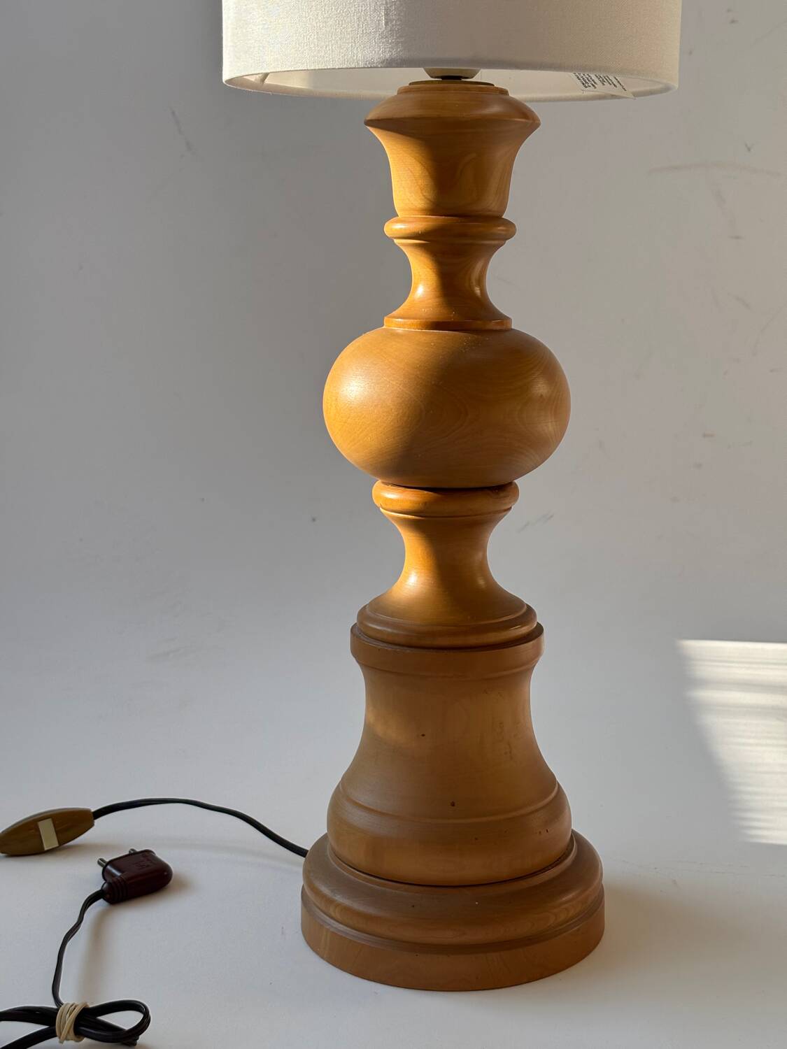 Turned wooden table lamp