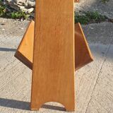 Magazine rack with sliding drawers in light wood, Scandinavian style.