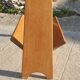 Magazine rack with sliding drawers in light wood, Scandinavian style.