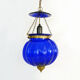 Suspension chandelier, oriental blue glass lantern and brass structure. Year 70-80
