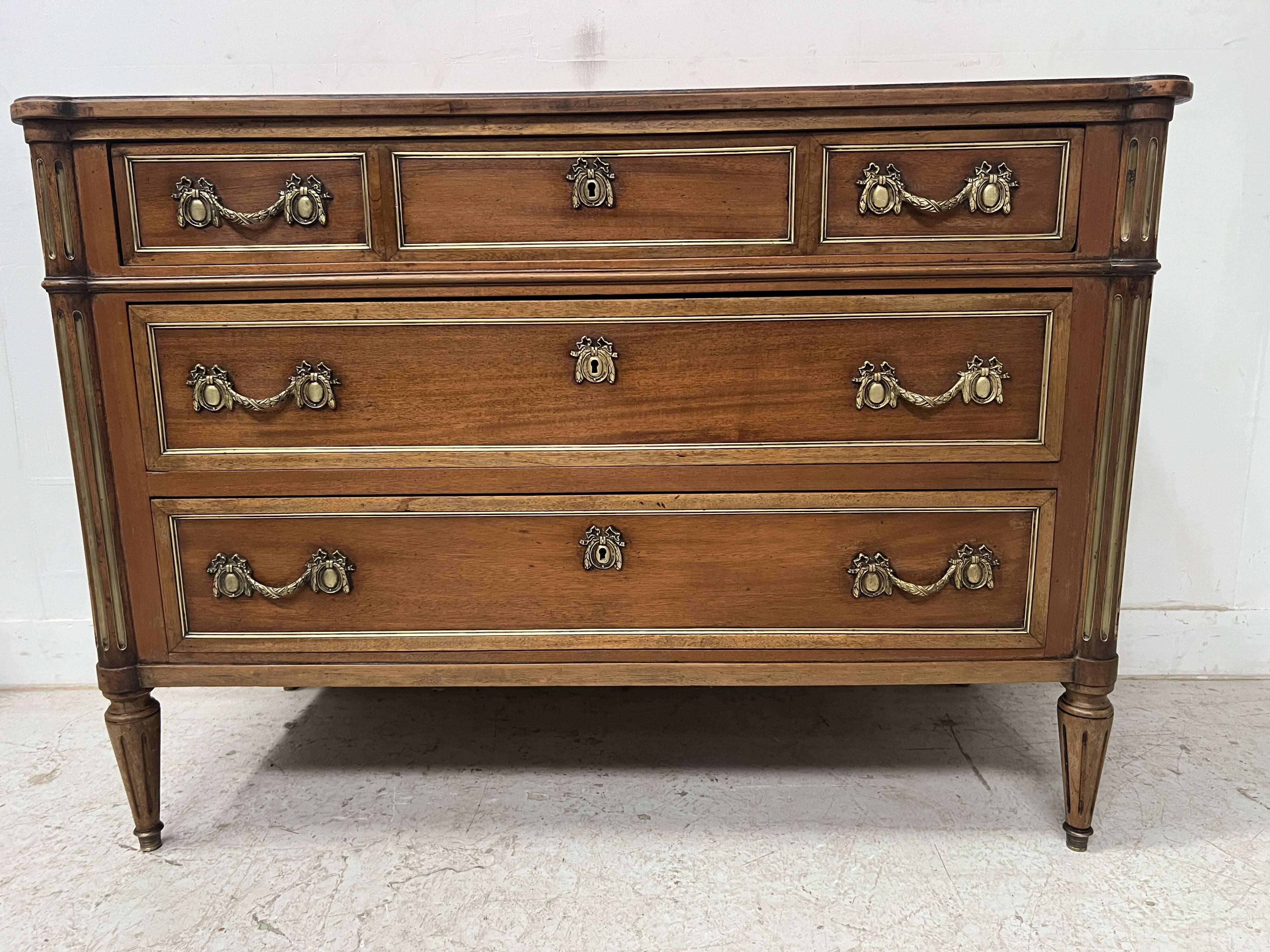 Louis XVI style mahogany commode with a grey veined marble top, 19th century