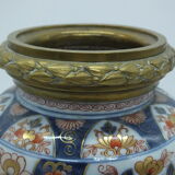 Bayeux/Imari vase mounted in porcelain with bronze frame