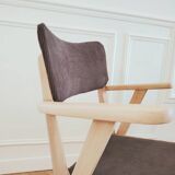 Renovated vintage armchair, bridge from the 1950s.