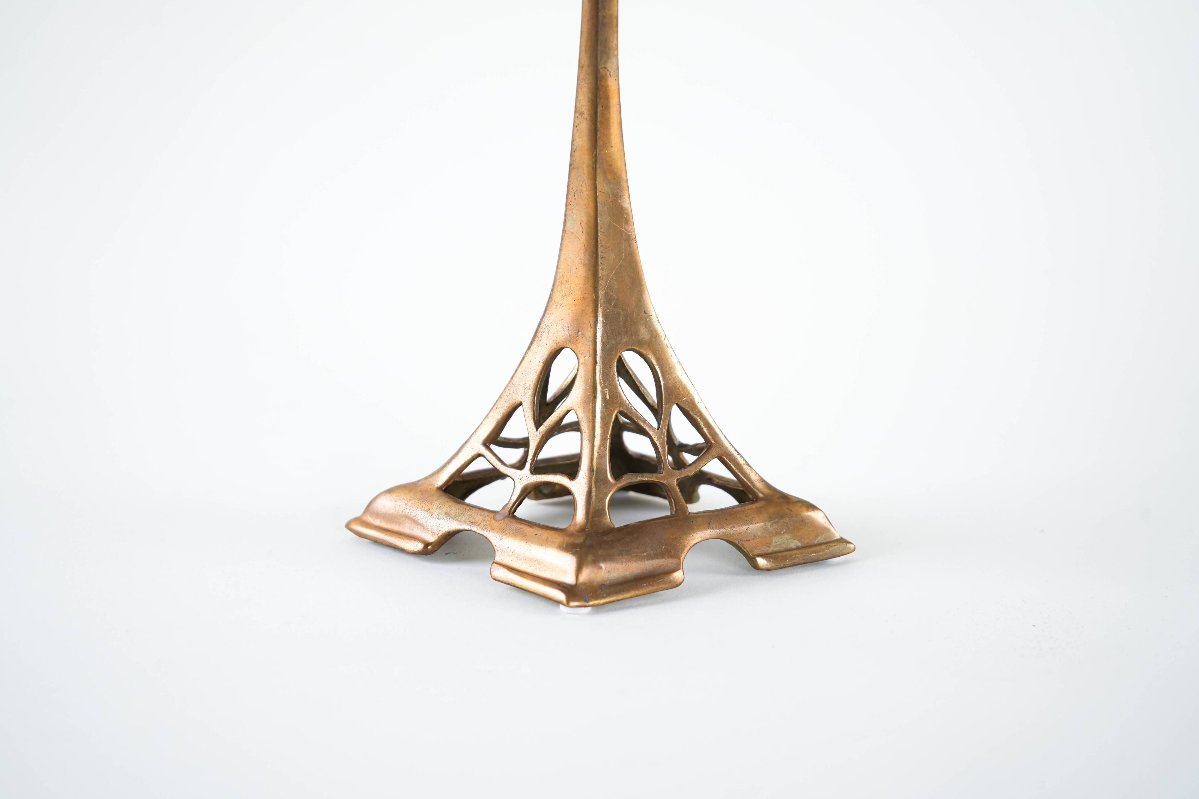 Art Nouveau brass candlestick with floral ornamentation, two arms, European