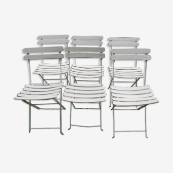 Serie de 6 chaises de jardin pliantes en fer et lattes de bois anciennes