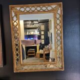 Mirror with parecloses