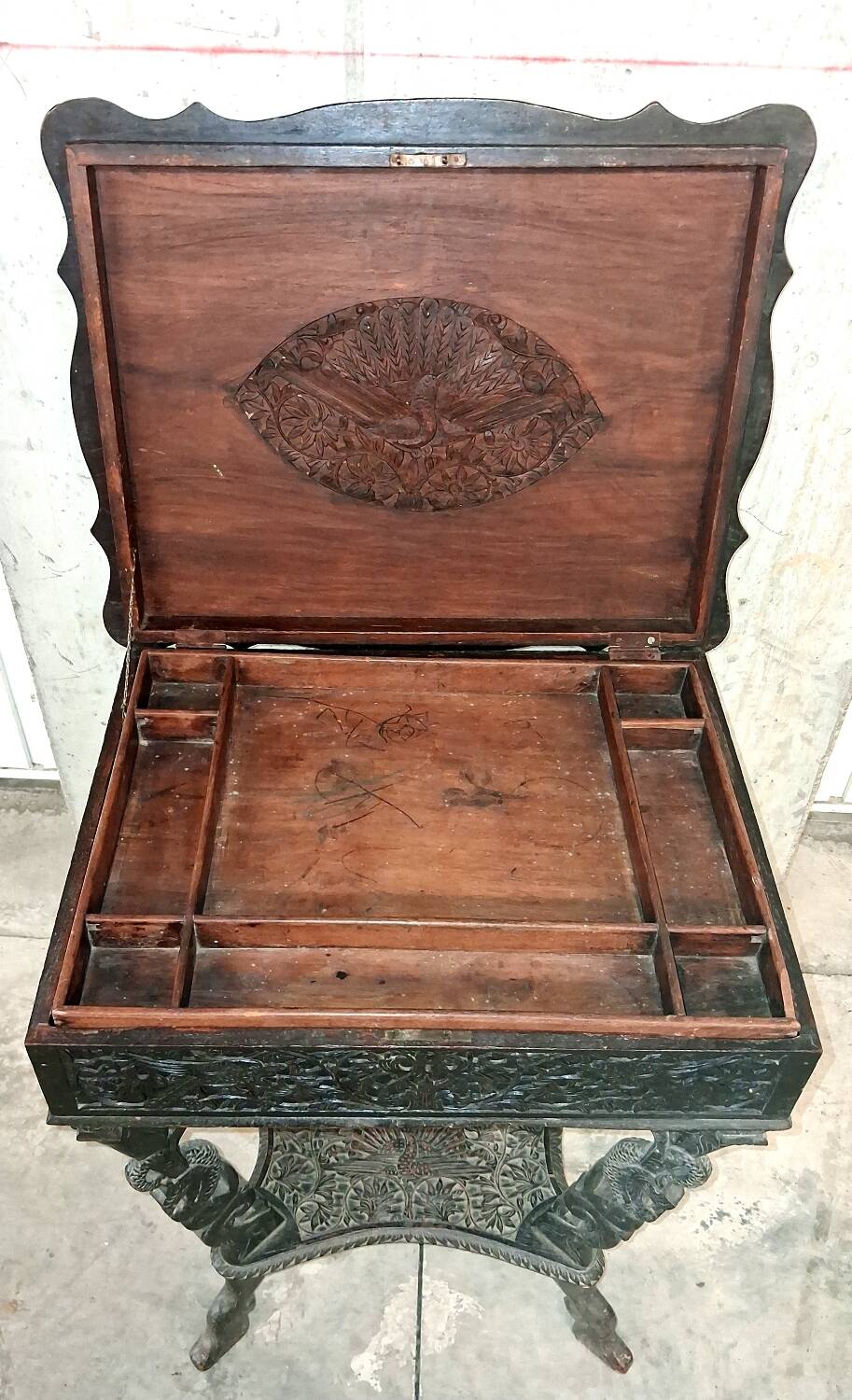 Ethnic carved wooden worker's furniture