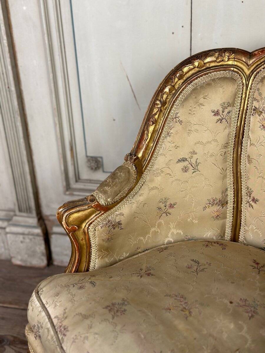 A Louis XV style child's bergère chair in carved and gilded wood, circa 1880