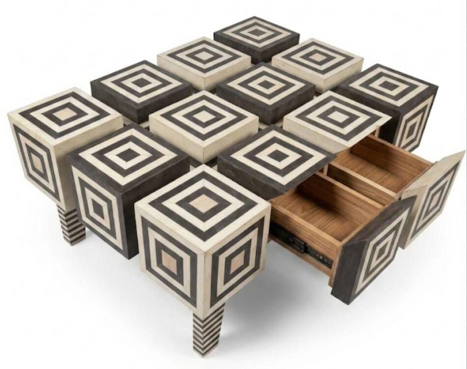 An Art Deco Op Art coffee table made of beech wood with drawers.