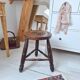 Tabouret tripode en bois massif