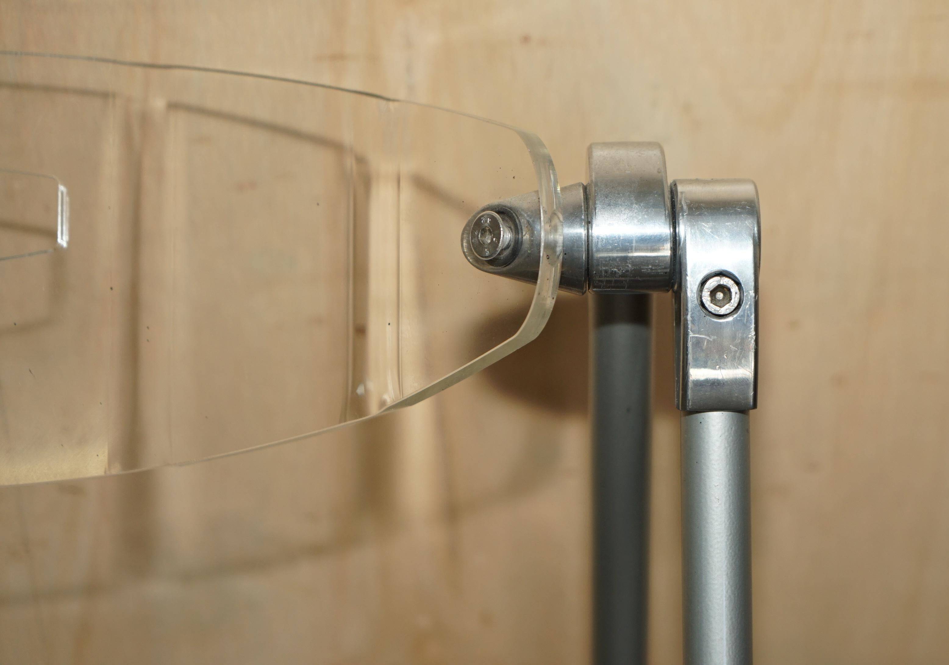 Metal and lucite folding chair, swivel backrest.