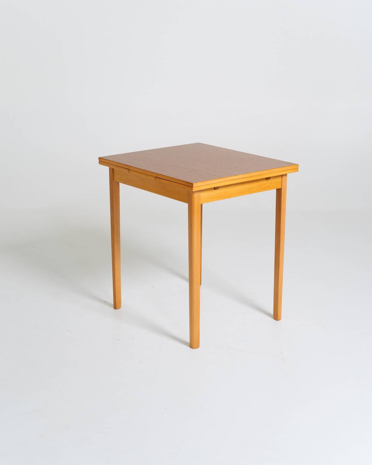 Extendable dining table in laminate and beech, Sweden, 1950s-60s