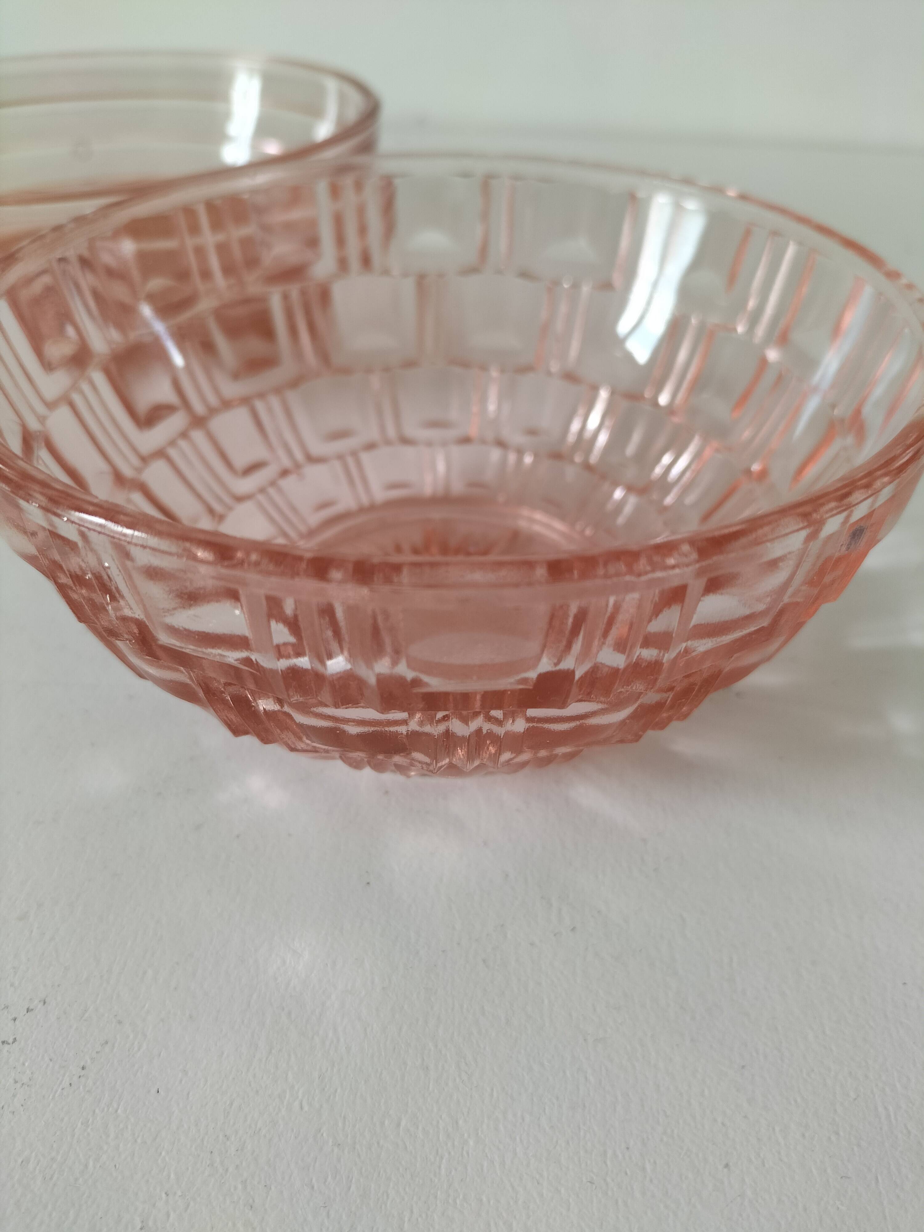 Duo of orange-pink pressed glass bowls