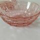 Duo of orange-pink pressed glass bowls
