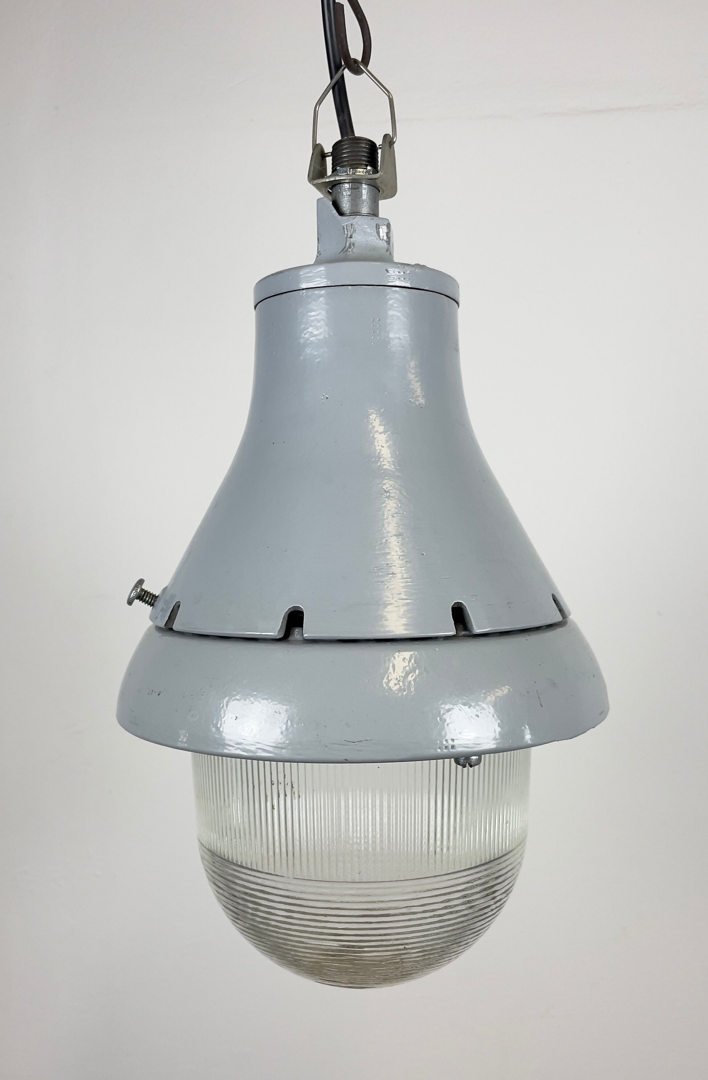 Grey industrial explosion proof light from Crouse-Hinds, 1970s