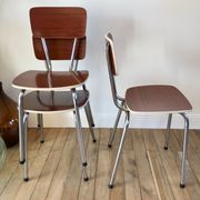 Trio of chairs in light brown formica and cream contour 70s