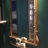 Console design in brushed steel and glass