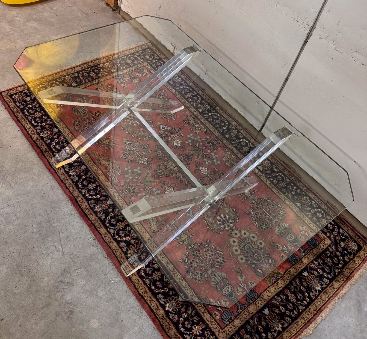 Designer coffee table in glass with an altuglass base.