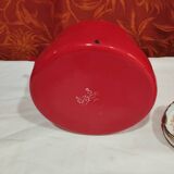 red enamelled sheet metal kettle