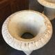Pair of medicid vasques, cast, exterior