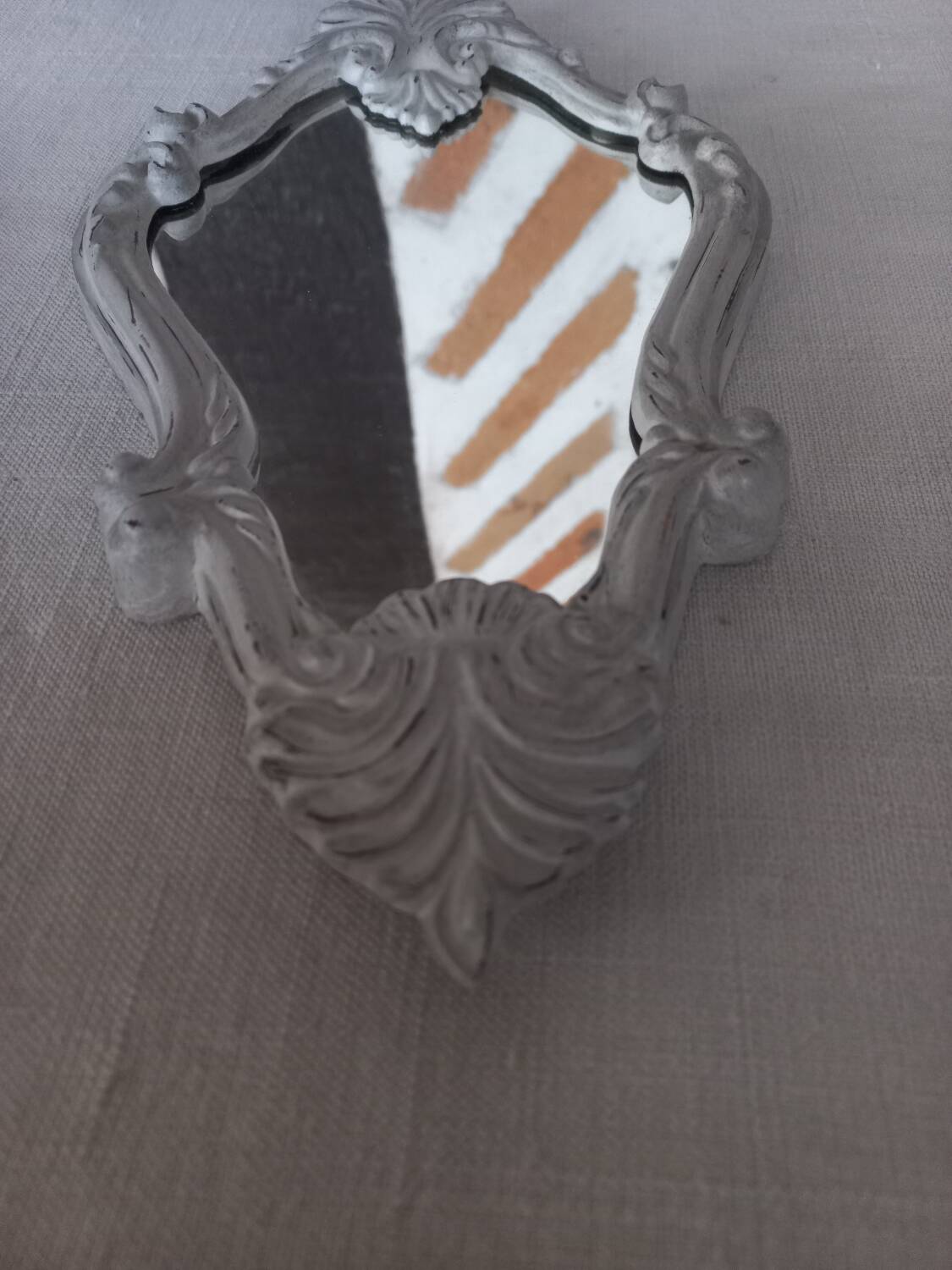 Small patinated baroque mirror