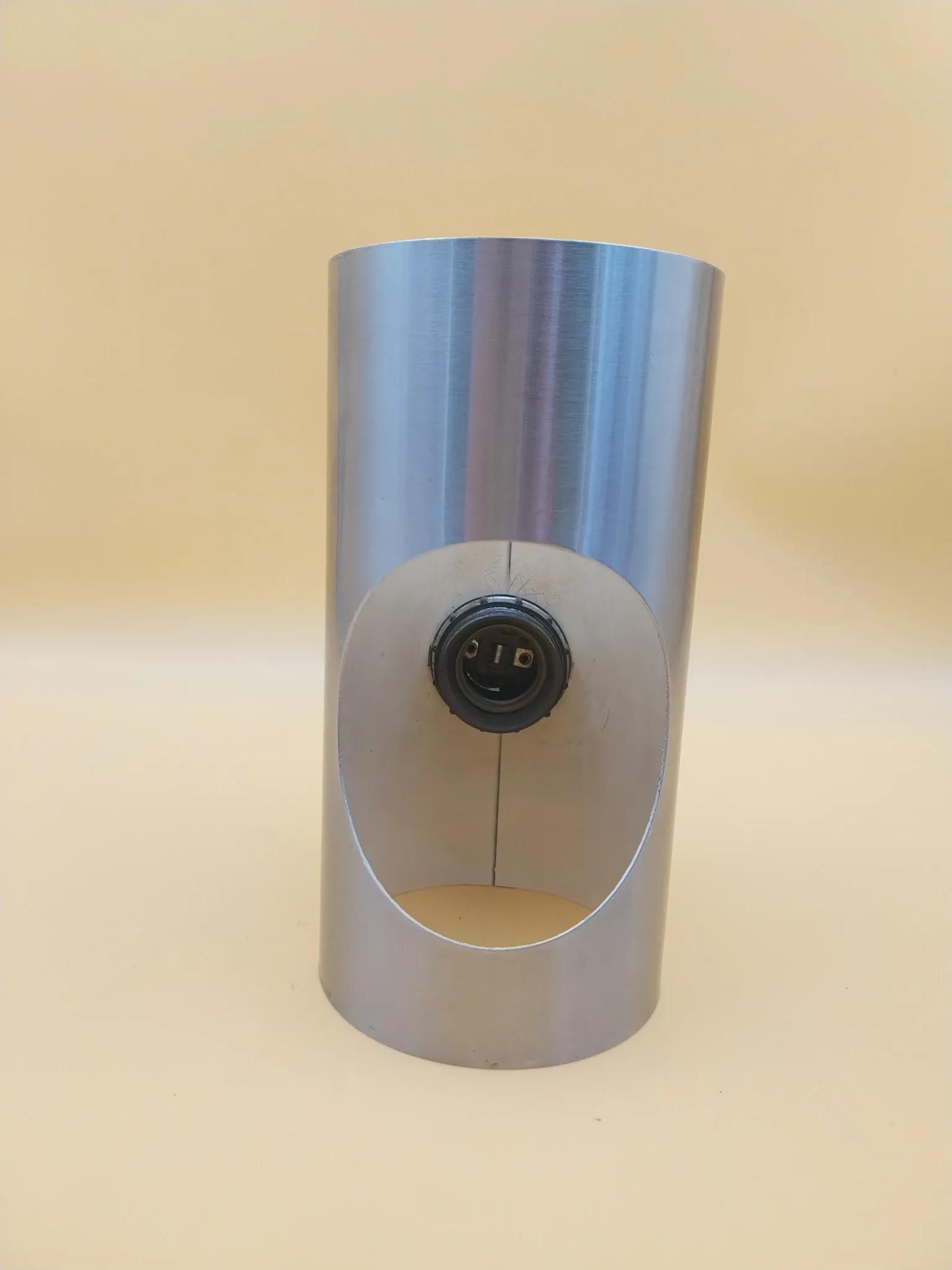 Brushed chrome metal wall light Max Sauze