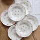 6 vintage white earthenware deep plates with red patterns