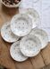 6 vintage white earthenware deep plates with red patterns