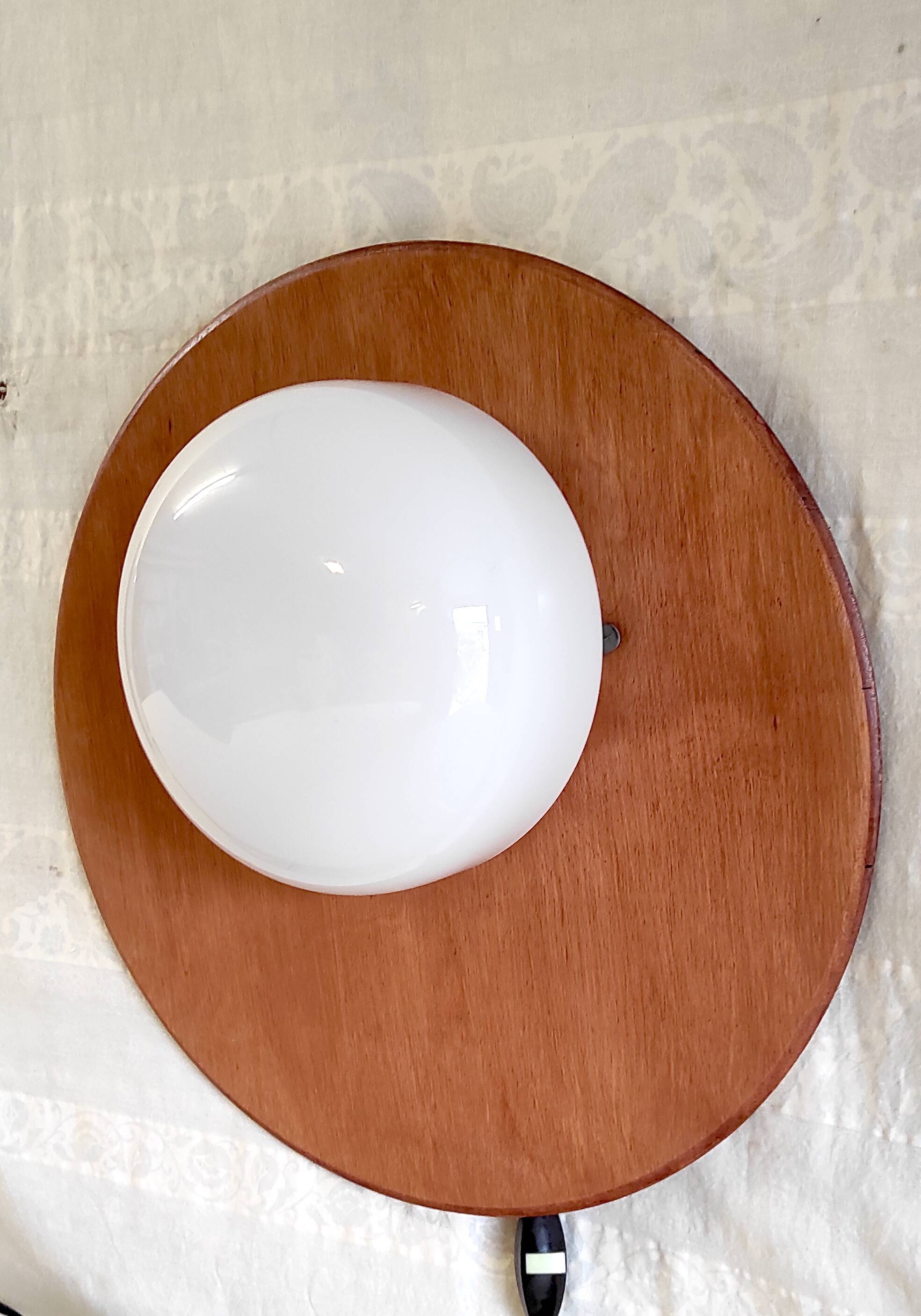 Globe-shaped wall sconces in opaline glass and wood - mid-20th century