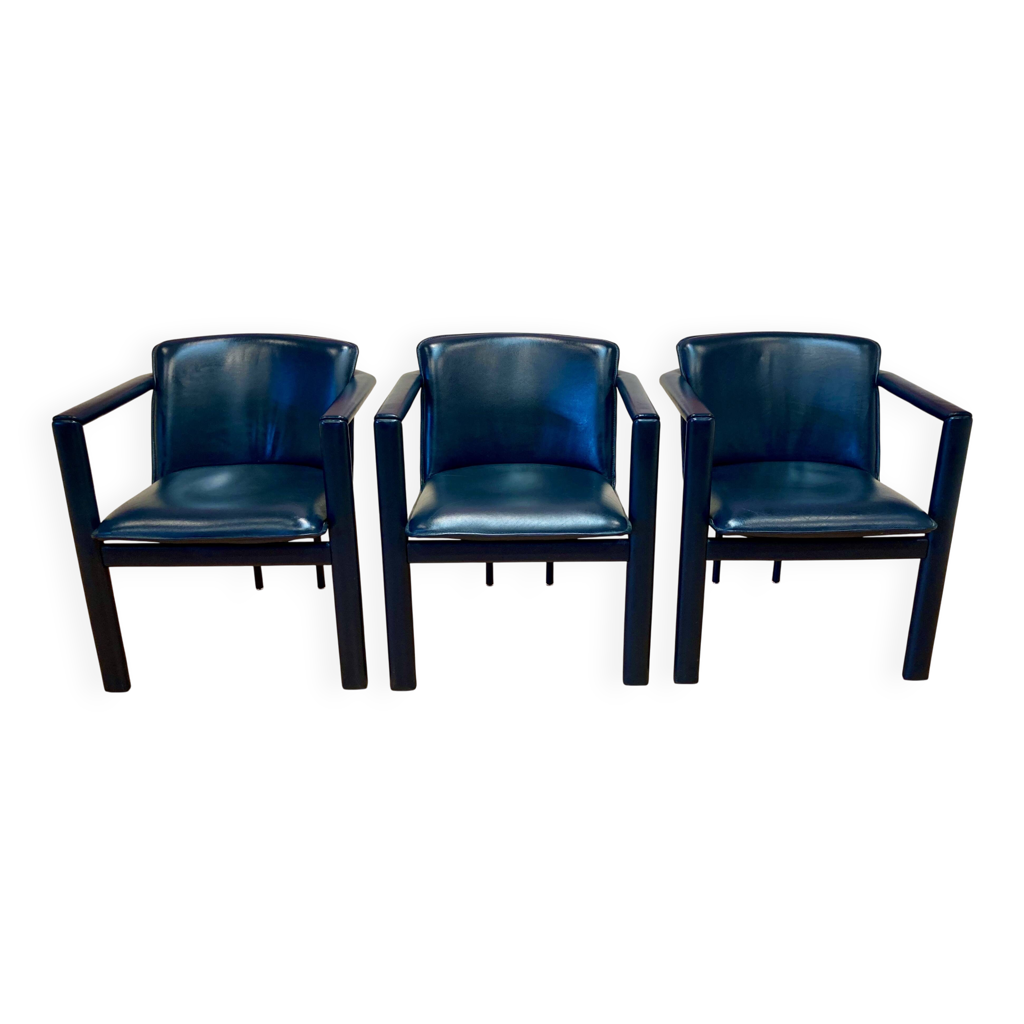 Set of 3 designer leather and metal armchairs.