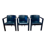 Set of 3 designer leather and metal armchairs.