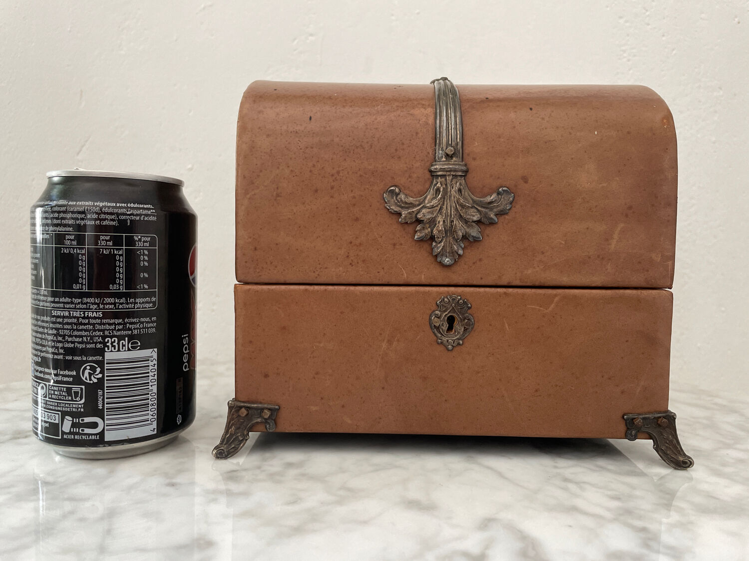 Vintage leather and silver metal jewelry box.