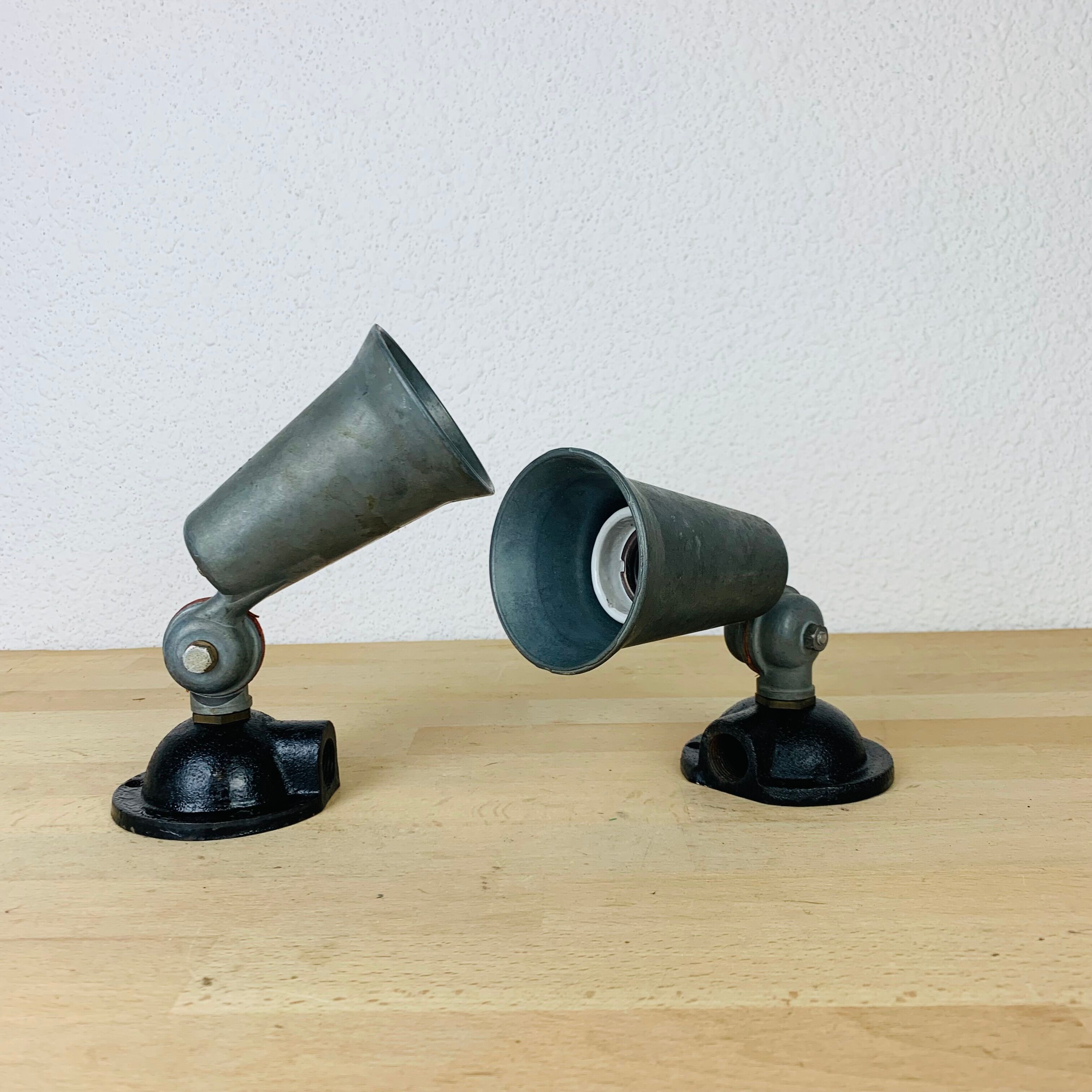 Pair of industrial metal spot wall lights in loft style.