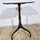 Antique octagonal mahogany side table on a classic tripod, 19th century.