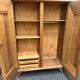 Armoire rotin pieds compas
