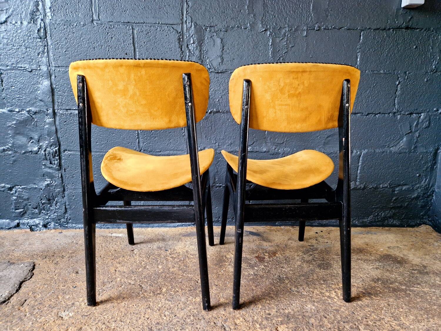 2 vintage chairs in black lacquered wood and yellow/mustard fabric, 1960