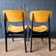 2 vintage chairs in black lacquered wood and yellow/mustard fabric, 1960