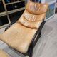 Vintage camel leather lounge chair with ottoman – wooden frame – 1970s