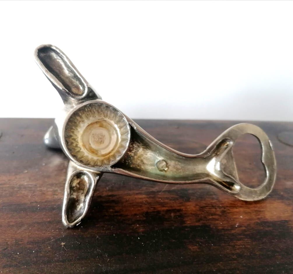Silver metal seal bottle opener
