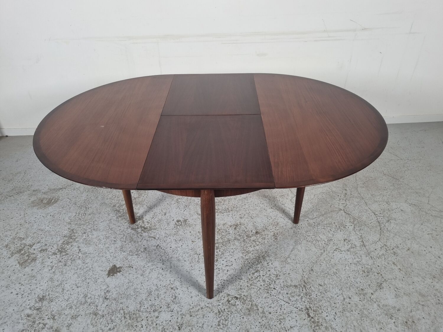 Lubke round rosewood dining table, 60s