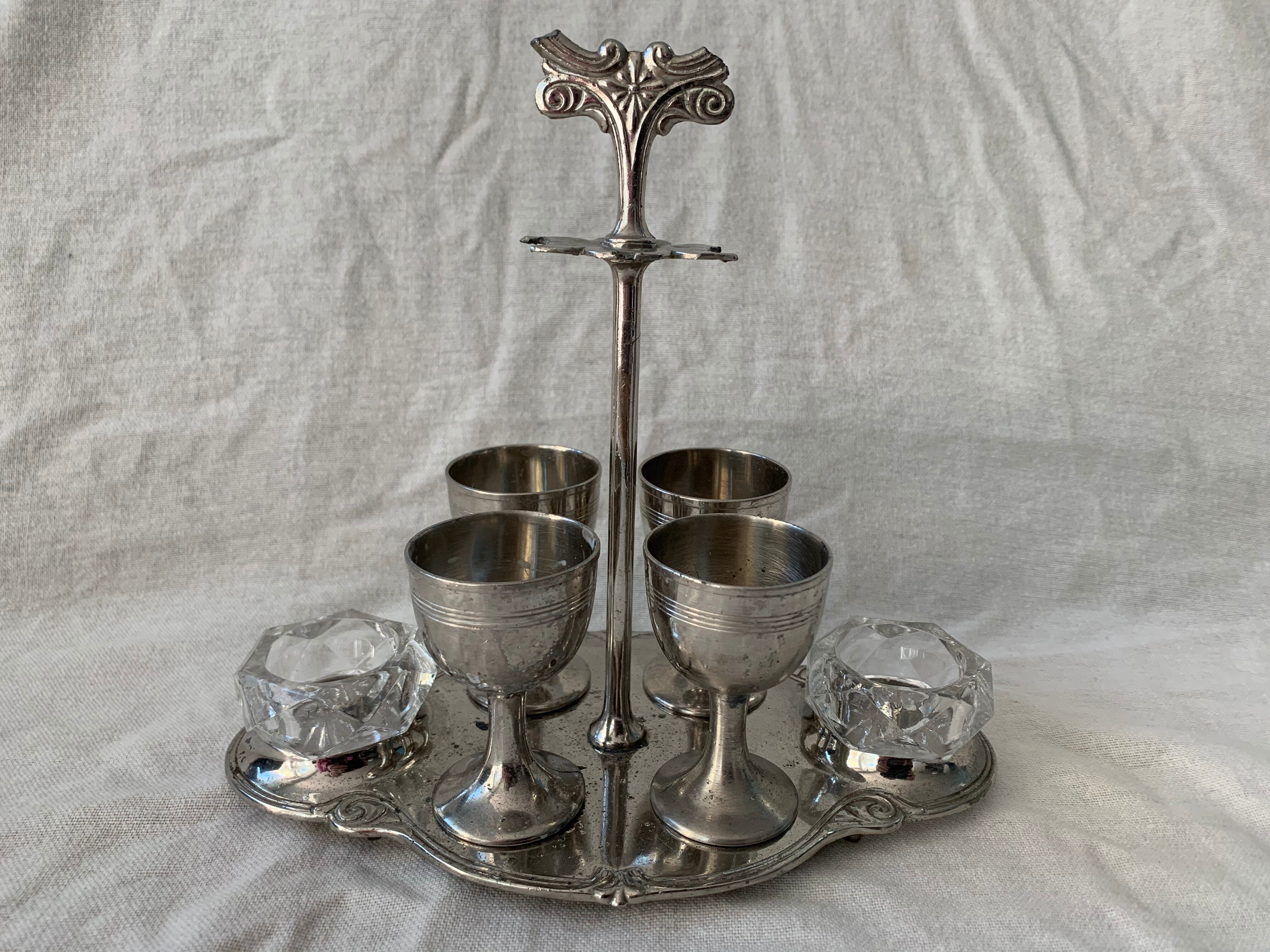 Old serving for boiled eggs with 4 metal cockroaches