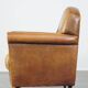 Stately, sleekly finished, comfortable sheepskin armchair