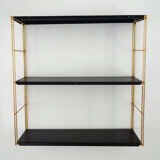 Modular wall shelf in twisted brass