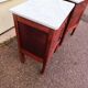 Set of 2 wooden and marble bedside tables.