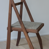 Walnut chair designed by Martin Gillis Studio