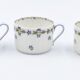 Trois tasses et sous tasses à thé en porcelaine de Limoges Haviland décor au barbeau
