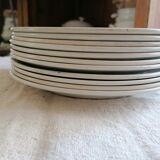 Set of 11 flat earthenware plates